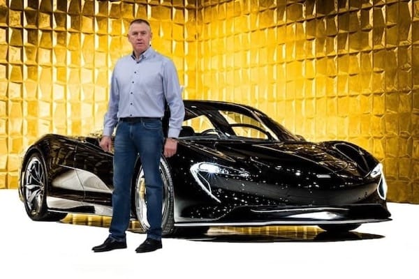 Person in front of a car